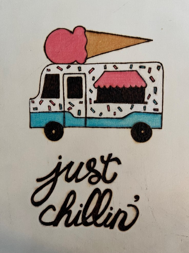 pyrography of an ice cream truck with words "just chillin"
